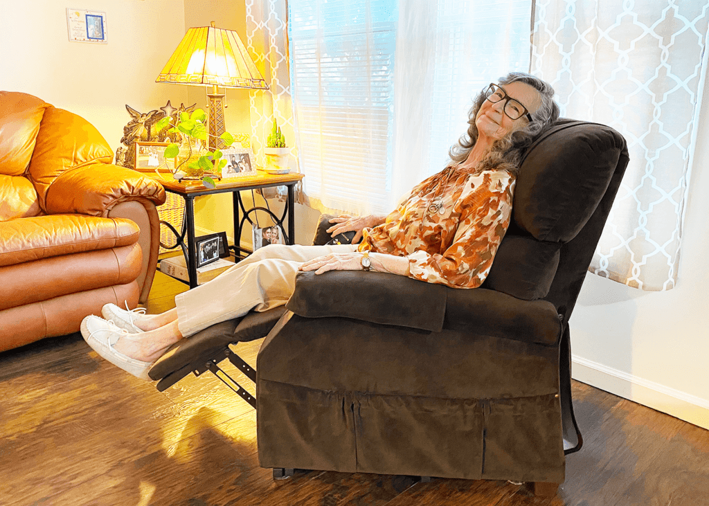 https://ultracomfort.com/wp-content/uploads/2021/05/Joan-Garrison-in-an-UltraComfort-America-Power-Lift-Chair-Recliner-To-Help-Relieve-Arthritis-1024x731.png